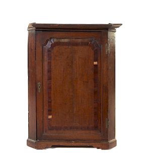 A George III Oak Hanging Corner Cabinet
Height 39 inches.