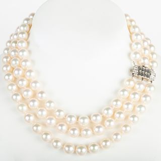 Triple Strand Cultured Pearl Necklace with a Platinum and Diamond Clasp