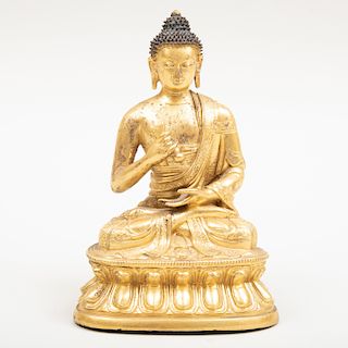 Tibetan Gilt-Bronze Figure of a Seated Medicine Buddha