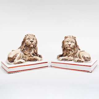 Pair of Wood & Caldwell Staffordshire Pearlware Lions