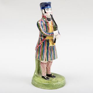 Staffordshire Pearlware Figure of a Bagpiper