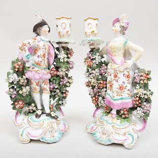 Pair of Chelsea Porcelain Figural Candlesticks of a Gallant and Companion