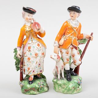 Pair of Derby Porcelain Figures of a Hunter and Companion