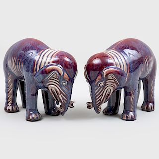Pair of Chinese Flambe Glazed Earthenware Models of Elephants