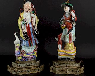 A Pair of Porcelain Immortals Mounted as Lamps.