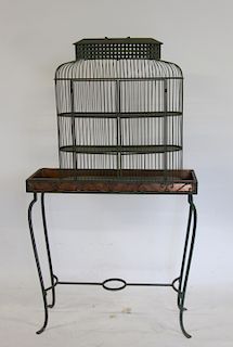 Antique Iron Planter Together With A Bird Cage