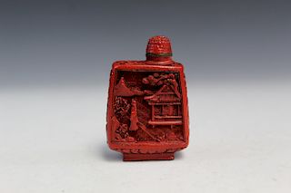 Chinese cinnabar snuff bottle. Qianlong Mark