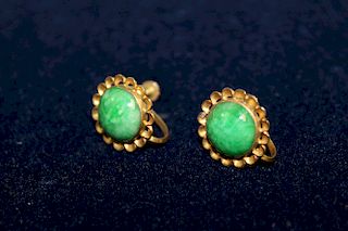 14 K gold and jadeite clip earrings.