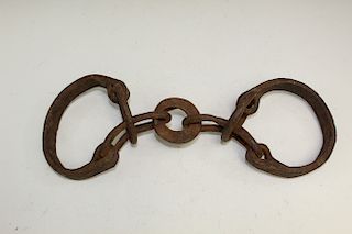 Hand forged iron slave shackles.