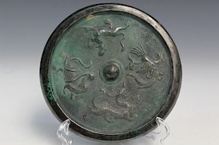 Chinese bronze mirror. Possibly Tang Dynasty.