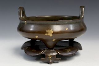 Chinese bronze incense burner with stand.