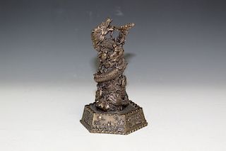 Chinese bronze dragon statue.