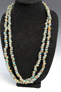 A long antique glass bead necklace.