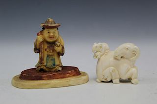 Two Chinese carved figures.
