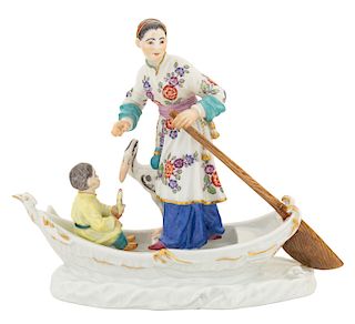 A RARE GERMAN JAPONAISERIE PORCELAIN FIGURAL GROUP IN A BOAT, MEISSEN, DRESDEN, EARLY 19TH CENTURY