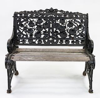 A TWO-PERSON WROUGHT IRON BENCH
