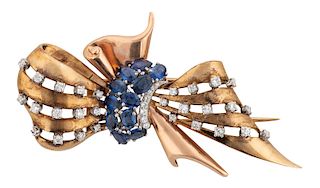 AN ART DECO YELLOW AND ROSE GOLD, SAPPHIRE AND DIAMOND PIN