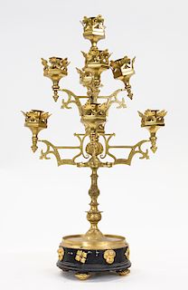 A BRASS GOTHIC REVIVAL CANDELABRA, LATE 20TH CENTURY