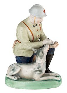 A LARGE RUSSIAN PORCELAIN FIGURE OF A RED ARMY SIGNALMAN WITH SERVICE DOG, GORODNITSKY PORCELAIN FACTORY, GORODNITSA, LATE 1930S