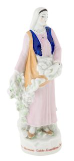 A SOVIET COMMERMORATIVE PORCELAIN FIGURINE OF AN AZERBAIJANI WOMAN FOR THE 1939 VDNKH EXHIBITION AFTER NATALYA DANKO (RUSSIAN 1892-1942), DULEVSKY POR