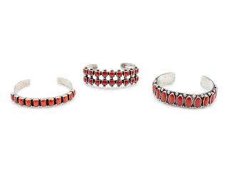 Three Navajo and Southwestern Sterling Silver and Coral Cuff Bracelets