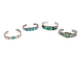 Four Fred Harvey-era Silver and Turquoise Cuff Bracelets
largest length 5 1/2 x opening 1 1/4 x width 1/2 inches