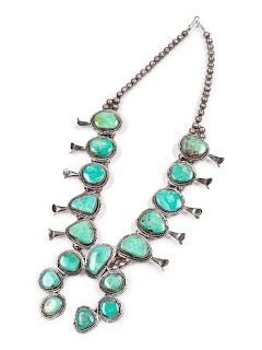 Navajo Silver and Turquoise Squash Blossom Necklace
overall length 15 inches; naja 3 3/4 inches
