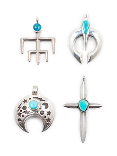 Four Southwestern Sterling Silver and Turquoise Pendants
largest height 4 3/4 x width 2 inches