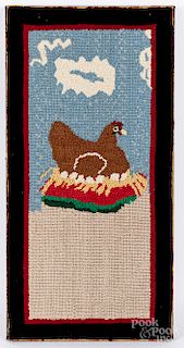 Hooked rug with a chicken