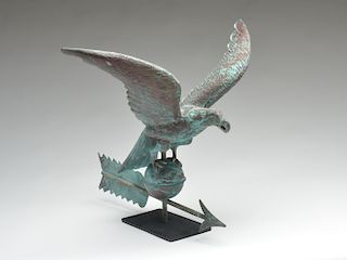 Full bodied copper weathervane of an eagle on an arrow.
