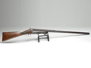 8 gauge breech loading shotgun, last quarter 19th century.