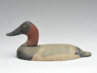 Cast iron sinkbox decoy patterned after a Will Heverin canvasback.