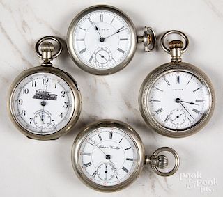 Four open-face pocket watches