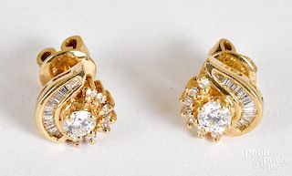 Pair of 18K yellow gold and diamond earrings
