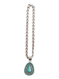 Sterling Silver and Turquoise Pendant Necklace
necklace length 18 inches, pendant length 2 7/8 x width 1 1/2 