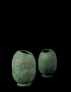 Louis Comfort Tiffany
(American, 1848-1933)
Pair of Favrile Ceramic Daisy Vases