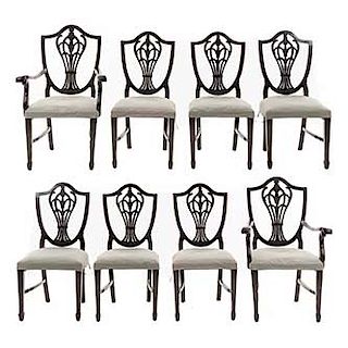 Lote de 6 sillas y 2 sillones. Siglo XX. Estilo Regencia. Con respaldos semiabiertos y asientos en tapicería color gris.