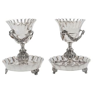 A PAIR OF BRAZIERS. MEXICO, 20TH CENTURY. Sterling 0.925 Silver. Marked VILLA. Gallonated edge decorated with chiseled vegetal motifs. Weight: 1,237 g