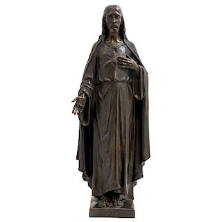 SACRED HEART OF JESUS. FRANCE, 20TH CENTURY. Bronze figure. Based on the sculpture of EUGÈNE BÉNET (FRANCE, 1863-1942) inside the Basilica of the Sacr