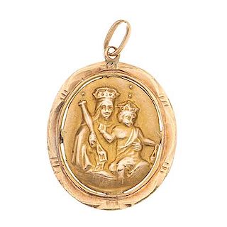 Medalla rellena en oro amarillo de 8k. Imagen de Virgen en relieve. Peso: 2.4 g.