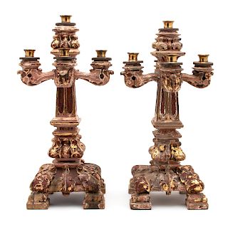 A Pair of Italian Baroque Style Carved, Painted and Parcel Gilt Five-Light Candelabra
Height 20 1/2 inches.