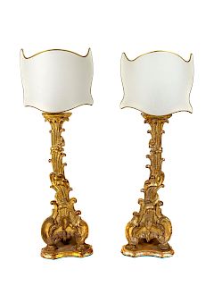 A Pair of Italian Carved Giltwood Pricket Sticks
Height with shades 39 3/4 inches.