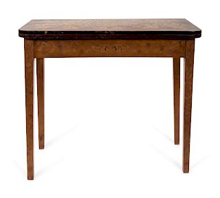 A Dutch Marquetry Flip Top Card Table
Height 27 1/2 x width 32 1/2 x depth 15 3/4 (closed).