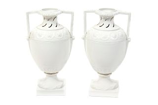 A Pair of KPM Blanc-de-Chine Porcelain Urns
Height 13 inches.