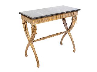 A Swedish Carved Giltwood Console Table
Height 33 1/4 x width 37 x depth 17 1/2 inches.