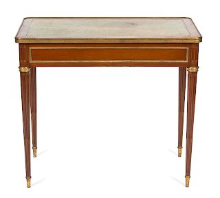 A Louis XVI Ormolu-Mounted Mahogany Table A Ecrire
Height 28 1/2 x width 32 1/2 x depth 17 3/4 inches.