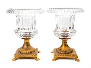 A Pair of French Gilt Bronze and Glass Urns
Height 8 inches.