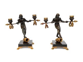 A Pair of Carriere-Belleuse Bronze and Gilt Bronze Candelabra
Height 9 x width 10 1/2 inches.