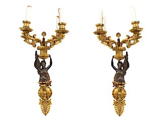 A Pair of Empire Style Gilt Bronze Three-Light SconcesHeight 22 x width 9 x depth 11 inches.