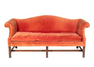 A George II Style Carved Mahogany Camel Back Sofa
Height 38 x width 74 inches.